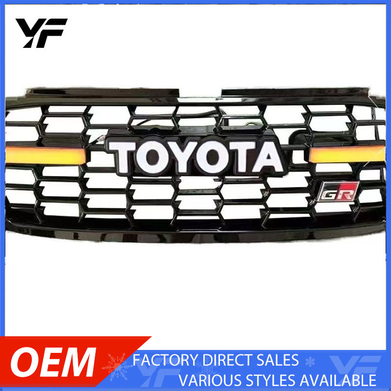 Retro grille upgrade for 14-17 year old Toyota Prado, featuring TOYOTA lettering and integrated lighting.